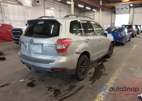 2015 Subaru Forester 2.5I Touring z USA, uszkodzony, nr VIN JF2SJAUCXFH533064